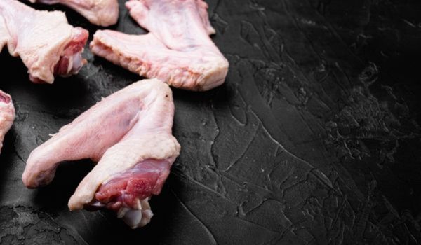 Raw Duck Wing on a Black Background